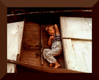 RC as child asleep in boat_Restored