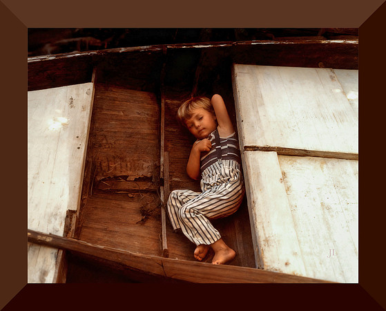 RC as child asleep in boat_Restored