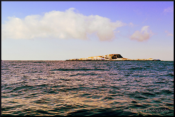 Sunrise on Snowy Hopson's Island with border