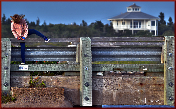 Girl Going Over a Bridge w border DSC_0546