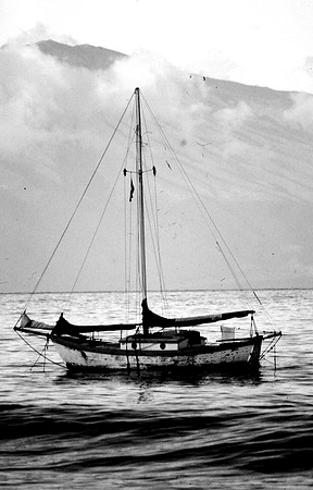 Old cutter-rigged sailboat off Maui B&W